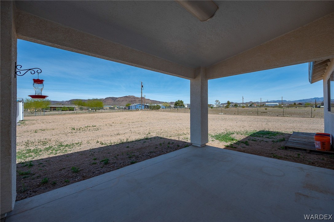 3411 West Carmichael Road Golden Valley, AZ 86413 - Photo 43 of 97 View of patio with a mountain view