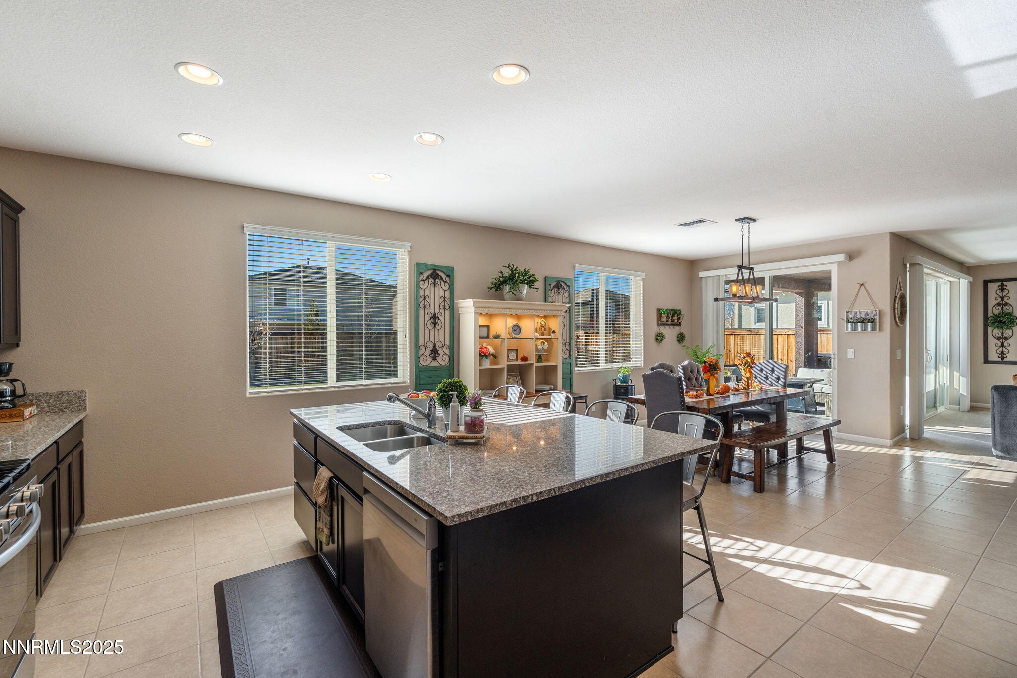 3090 Show Jumper Lane Reno, NV 89521 - Photo 12 of 42 a kitchen with counter top space and windows
