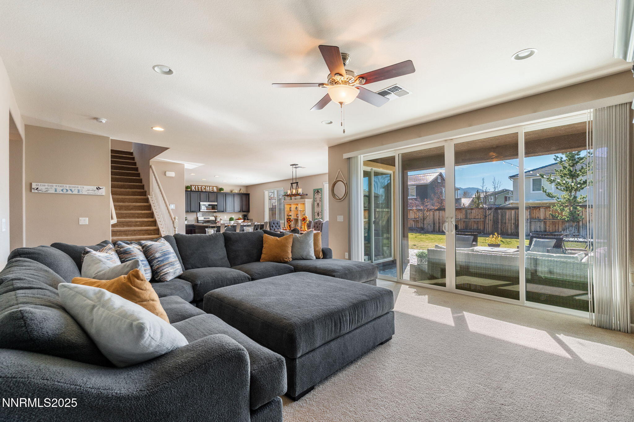 3090 Show Jumper Lane Reno, NV 89521 - Photo 15 of 42 a living room with furniture and a large window