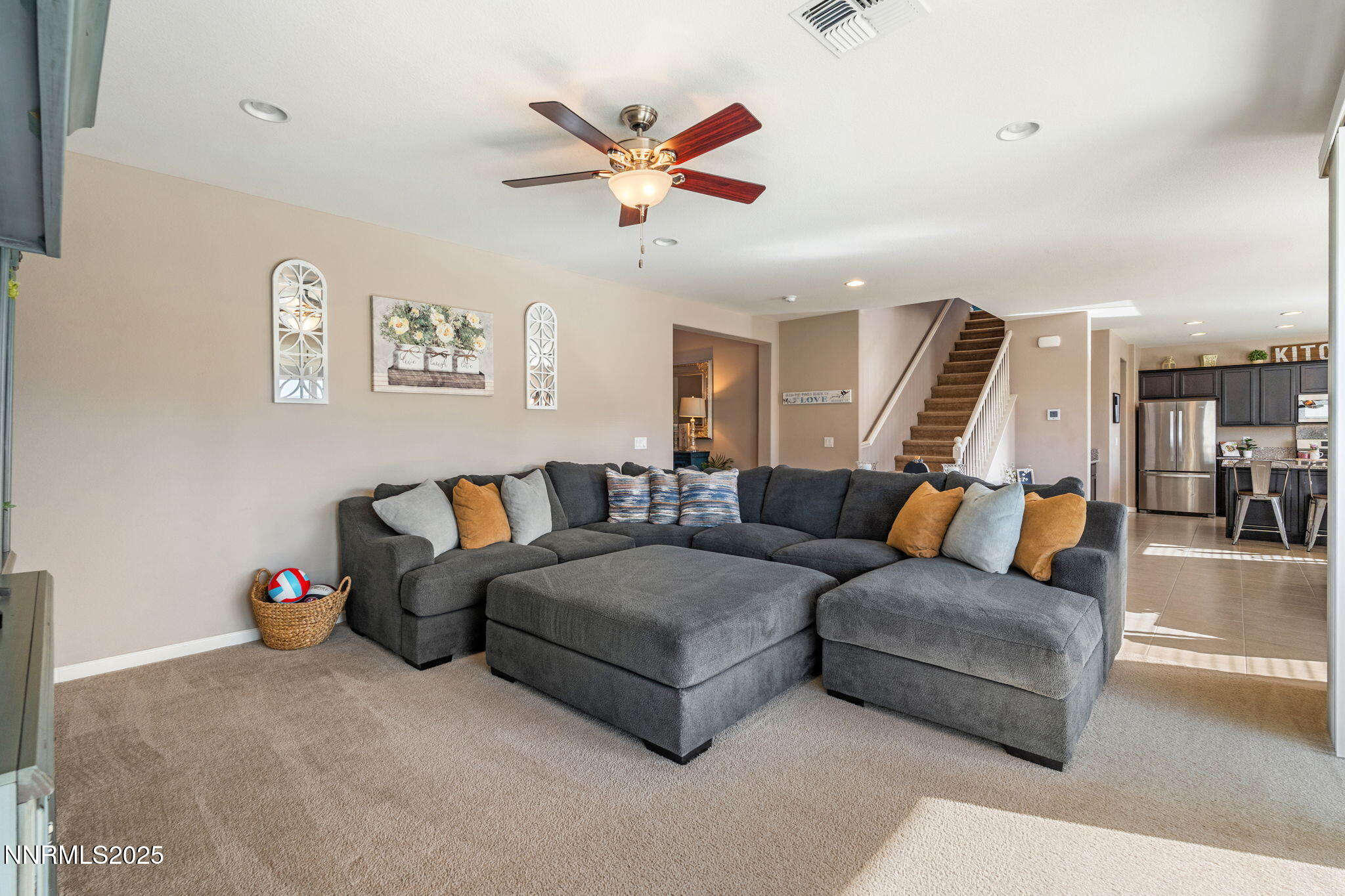 3090 Show Jumper Lane Reno, NV 89521 - Photo 16 of 42 a living room with furniture and kitchen view
