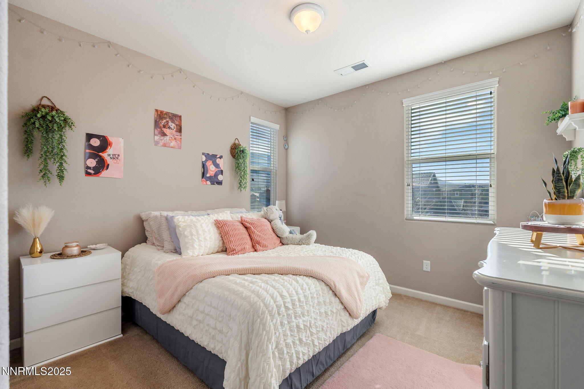 3090 Show Jumper Lane Reno, NV 89521 - Photo 33 of 42 a bedroom with a bed and a window