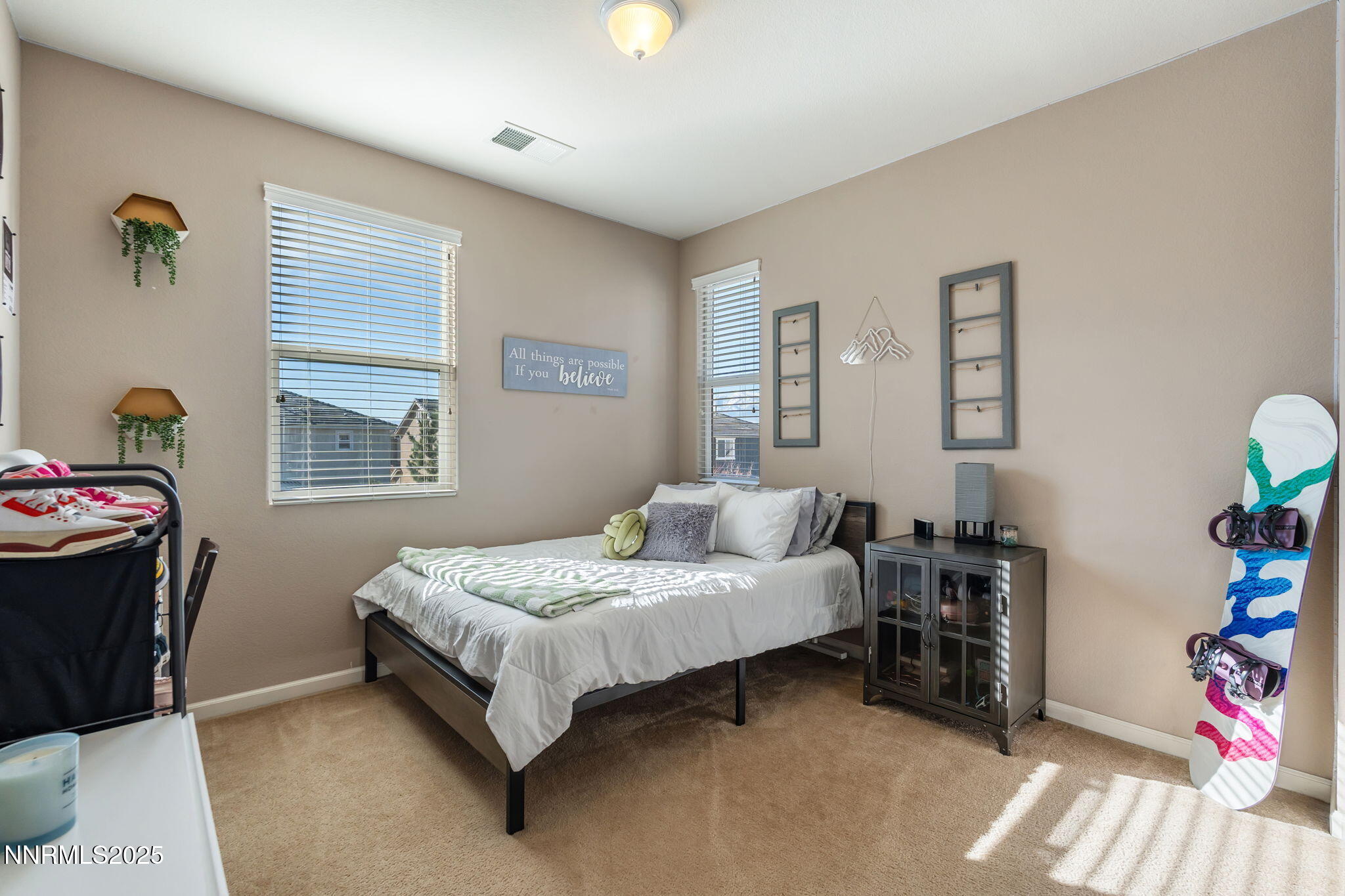 3090 Show Jumper Lane Reno, NV 89521 - Photo 34 of 42 a bedroom with a bed and a window