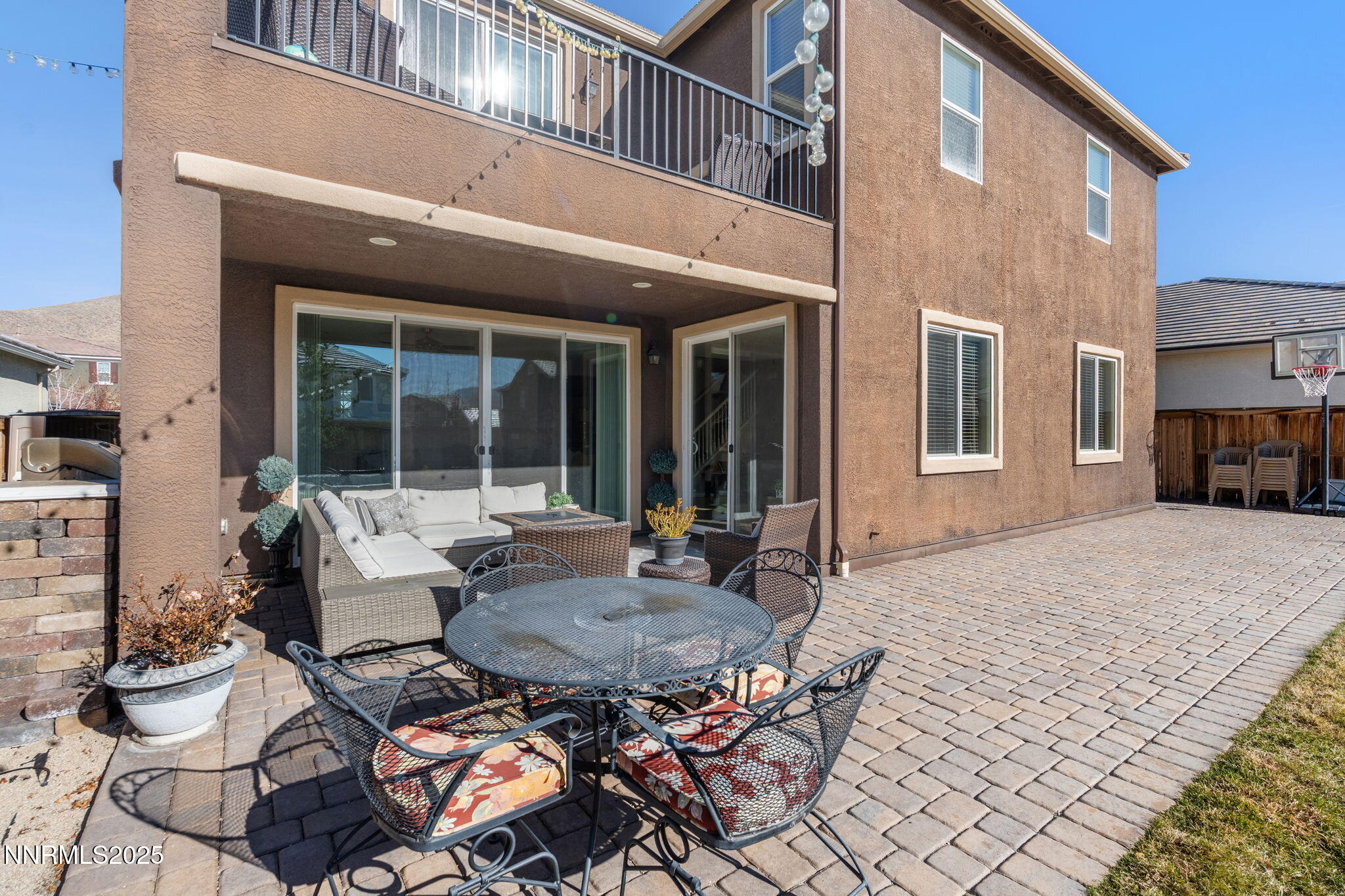 3090 Show Jumper Lane Reno, NV 89521 - Photo 40 of 42 a view of a patio with couches table and chairs and potted plants