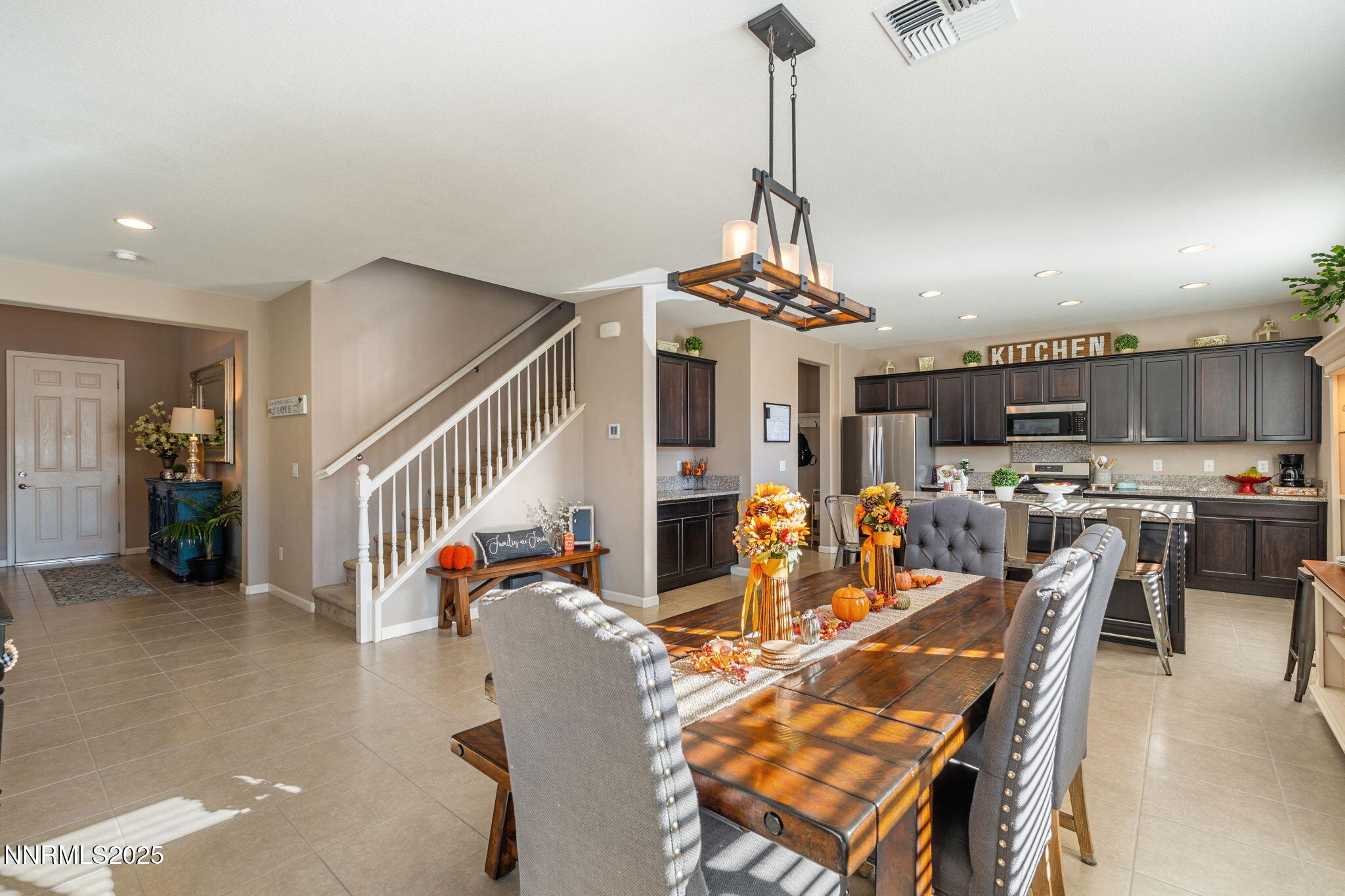 3090 Show Jumper Lane Reno, NV 89521 - Photo 5 of 42 a view of a dining room with furniture