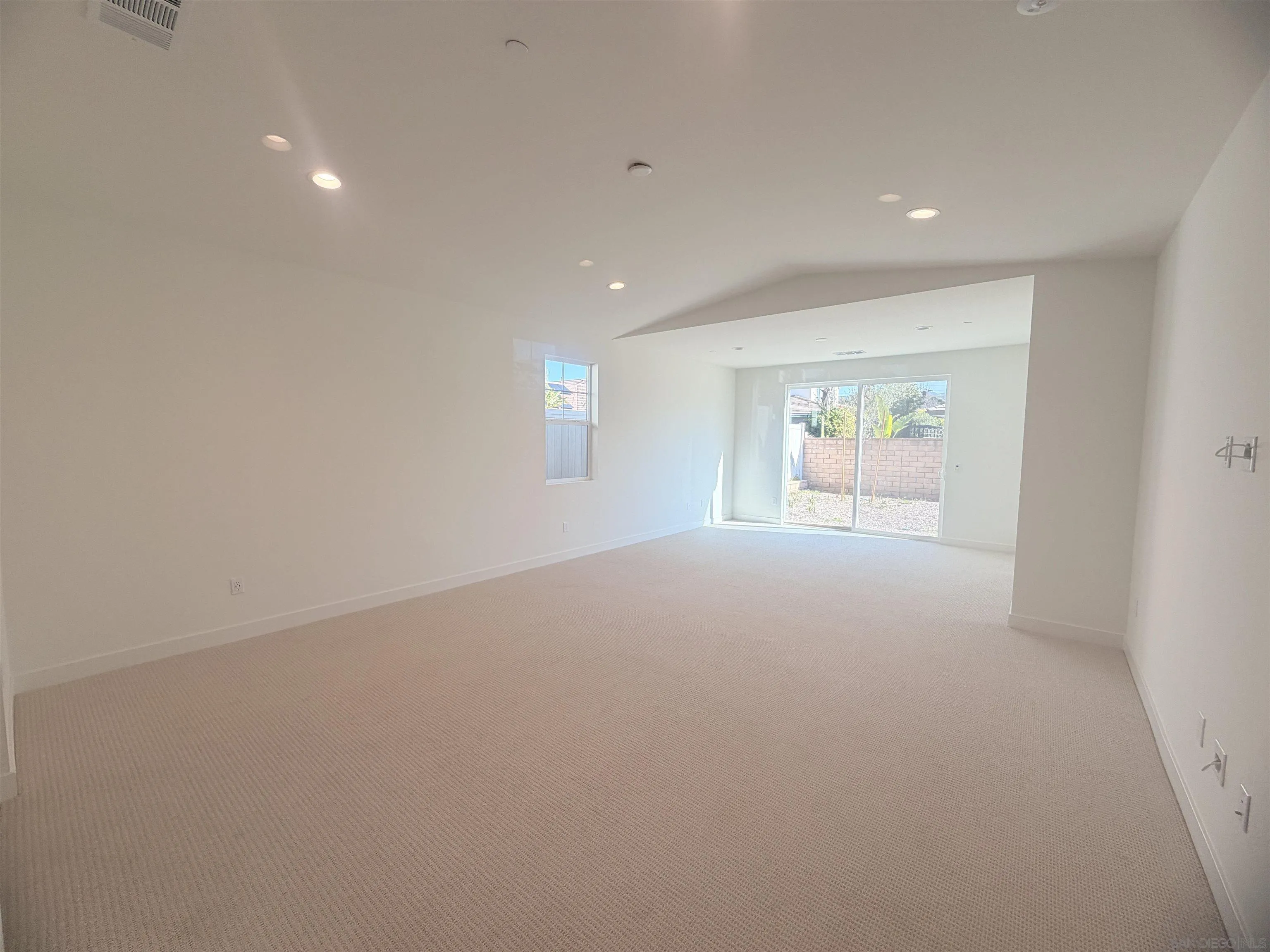 13765 Holly Oak Way Poway, CA 92064 - Photo 19 of 31 a view of an empty room with a window