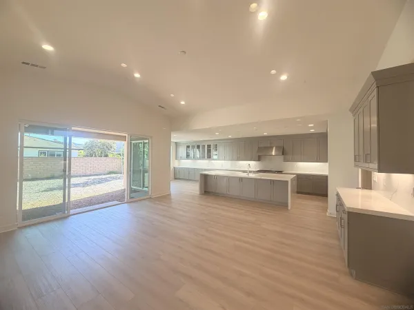 a view of kitchen with wooden floor