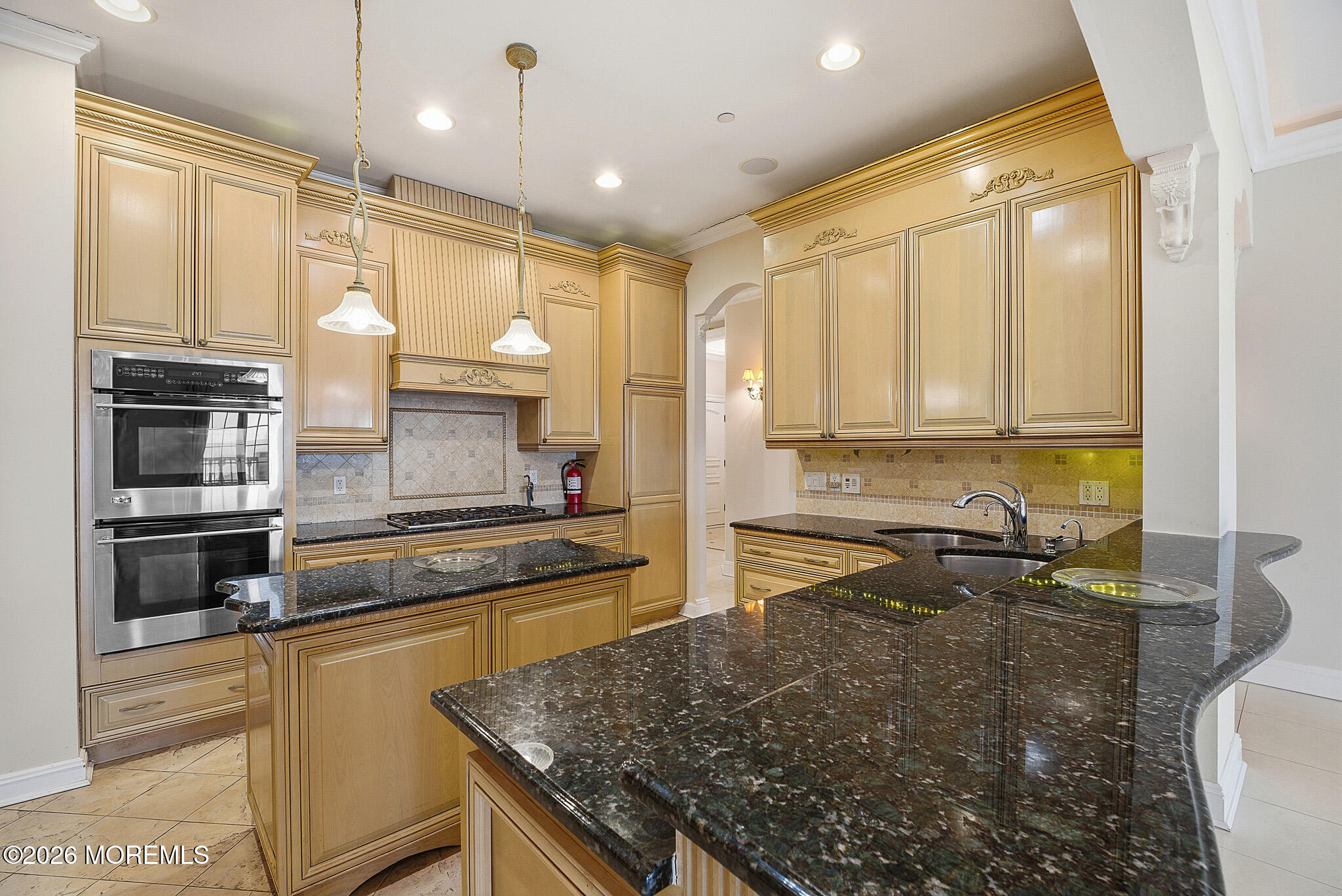 141 Riviera Drive Long Branch, NJ 07740 - Photo 11 of 41 a kitchen with a stove a sink and a refrigerator