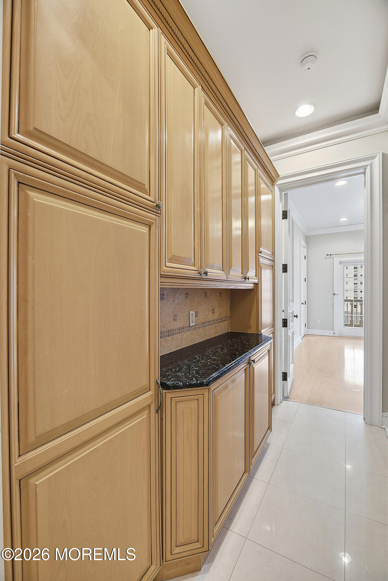 141 Riviera Drive Long Branch, NJ 07740 - Photo 14 of 41 a kitchen with stainless steel appliances a refrigerator sink and cabinets