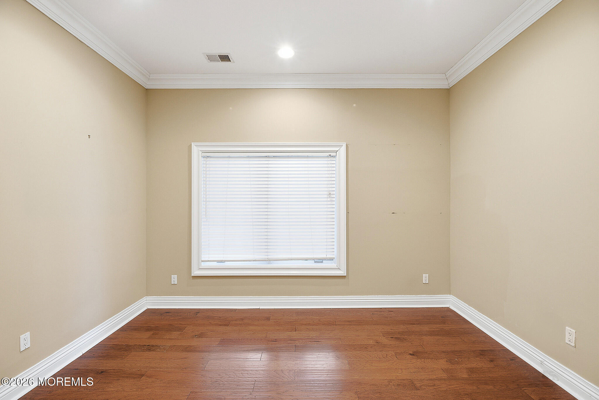 141 Riviera Drive Long Branch, NJ 07740 - Photo 16 of 41 an empty room with wooden floor and windows