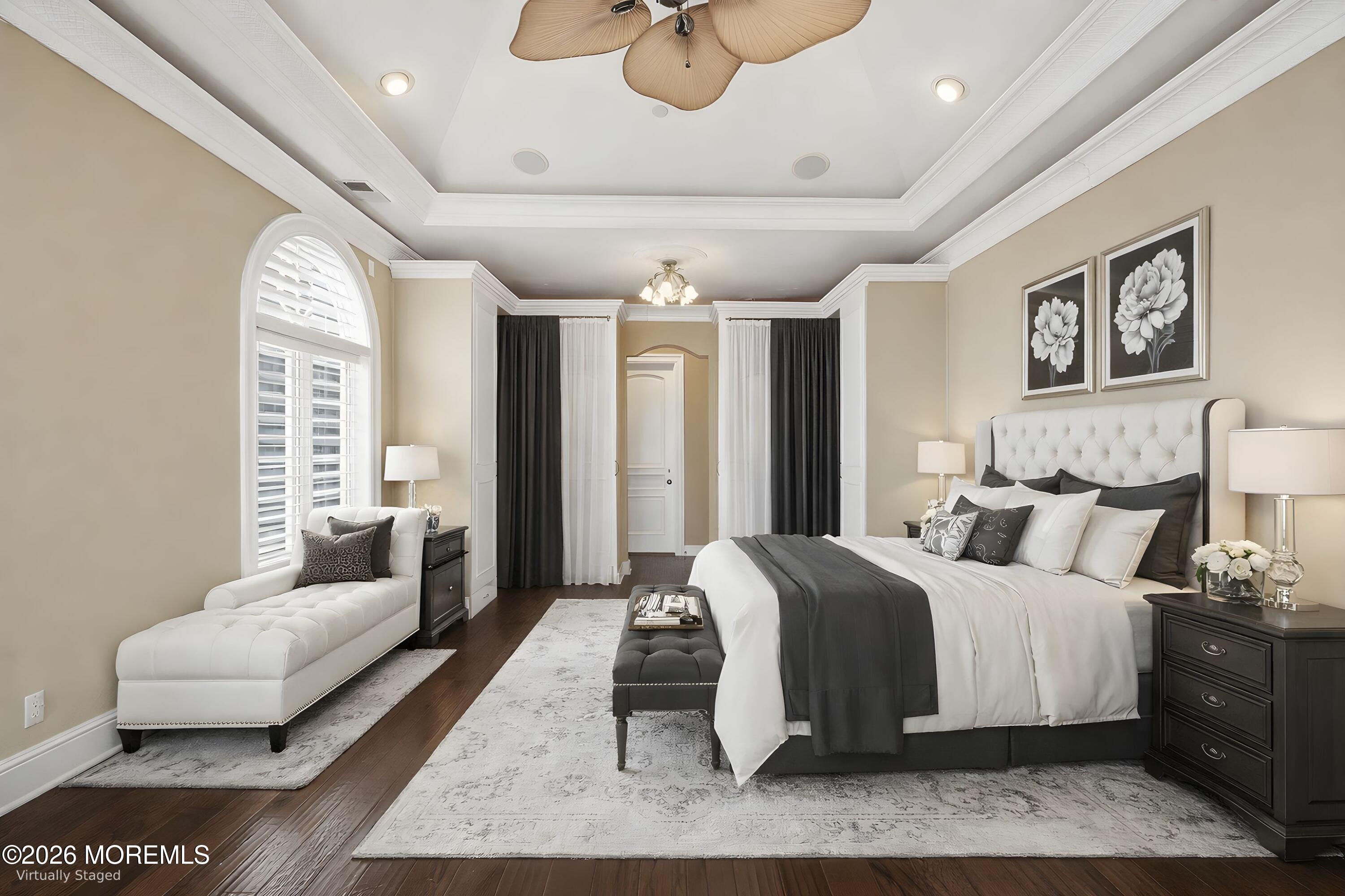 141 Riviera Drive Long Branch, NJ 07740 - Photo 19 of 41 a bedroom with a bed couches and wooden floor