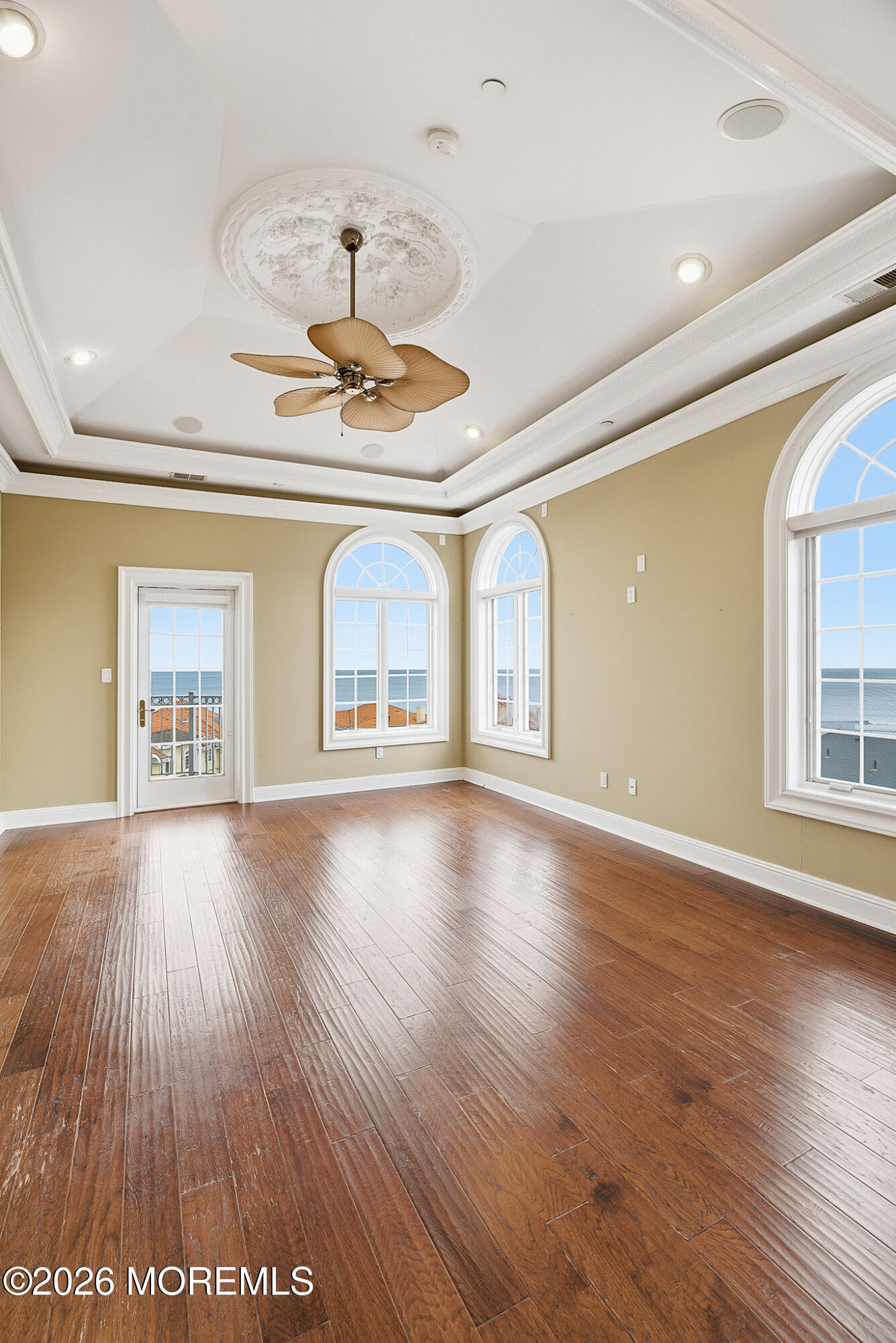 141 Riviera Drive Long Branch, NJ 07740 - Photo 20 of 41 an empty room with wooden floor and windows