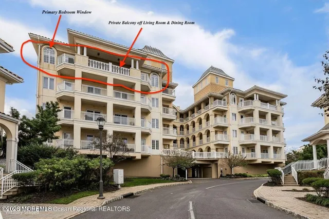 a front view of a building with street view and building