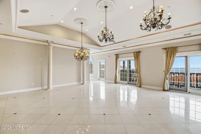 a view of an entryway with a chandelier