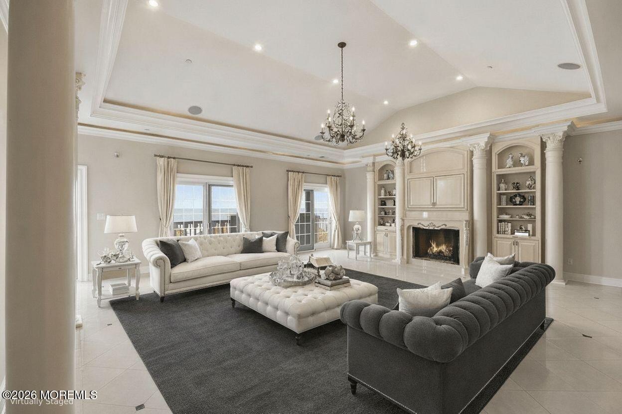 141 Riviera Drive Long Branch, NJ 07740 - Photo 8 of 41 a living room with furniture and a fireplace