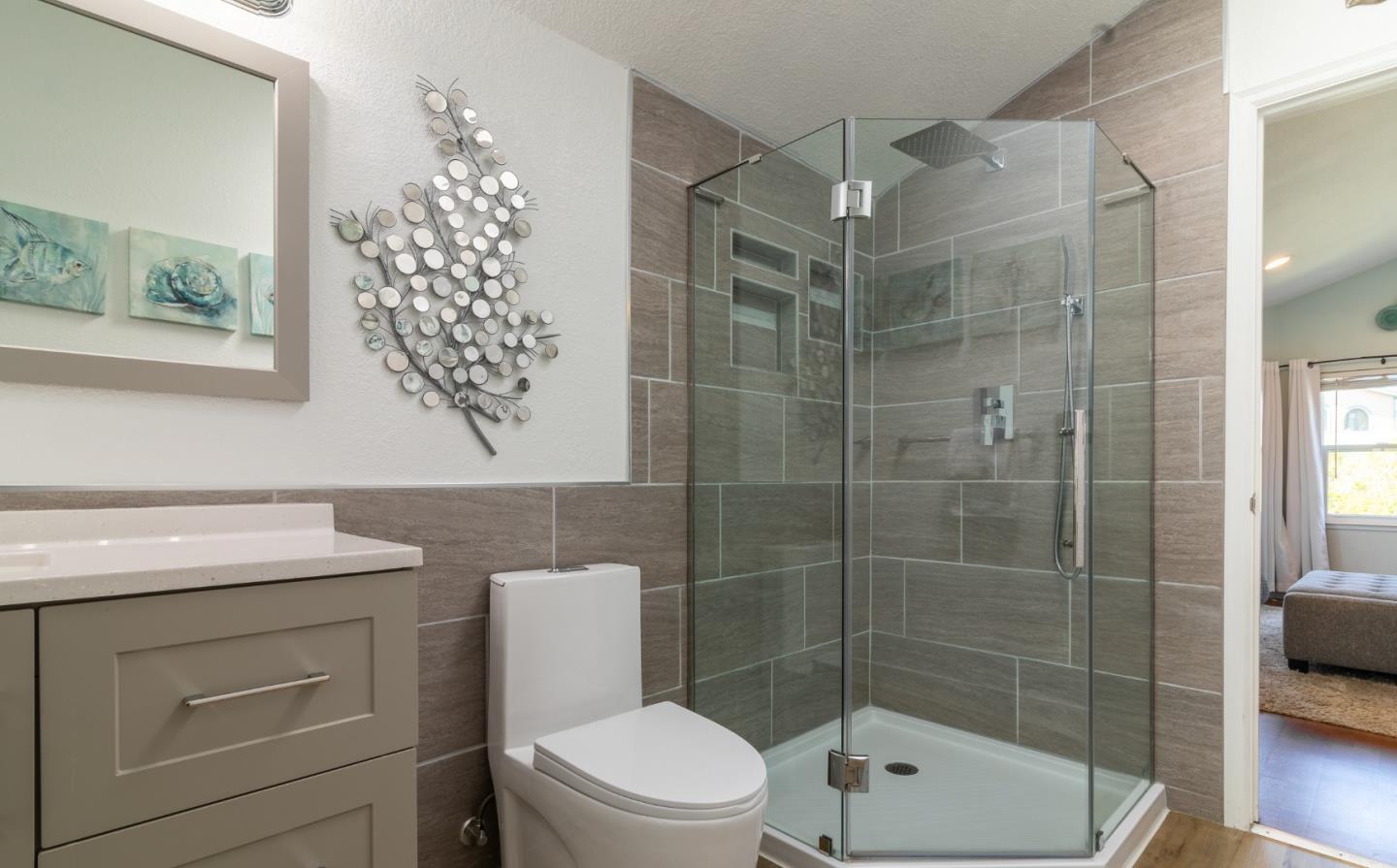 174 Pacific Avenue Pacifica, CA 94044 - Photo 20 of 31 a bathroom with a shower a toilet sink and mirror