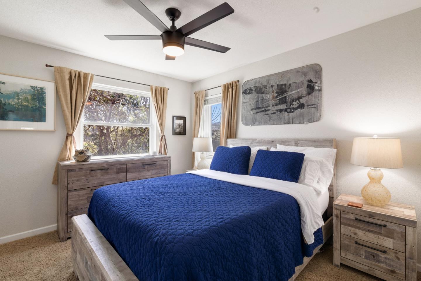 174 Pacific Avenue Pacifica, CA 94044 - Photo 22 of 31 a bedroom with a large bed and a window