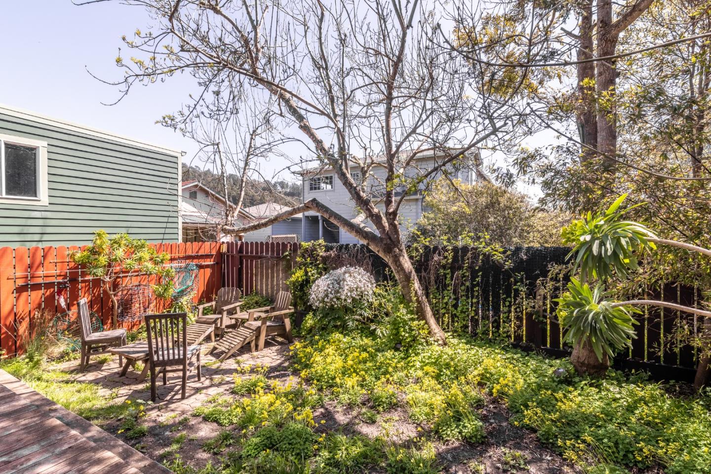 174 Pacific Avenue Pacifica, CA 94044 - Photo 6 of 31 a backyard of a house with lots of green space