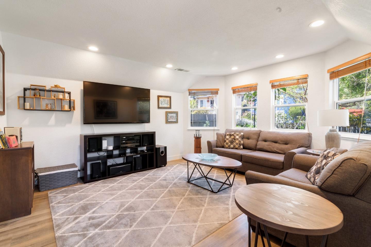 174 Pacific Avenue Pacifica, CA 94044 - Photo 7 of 31 a living room with furniture and a flat screen tv