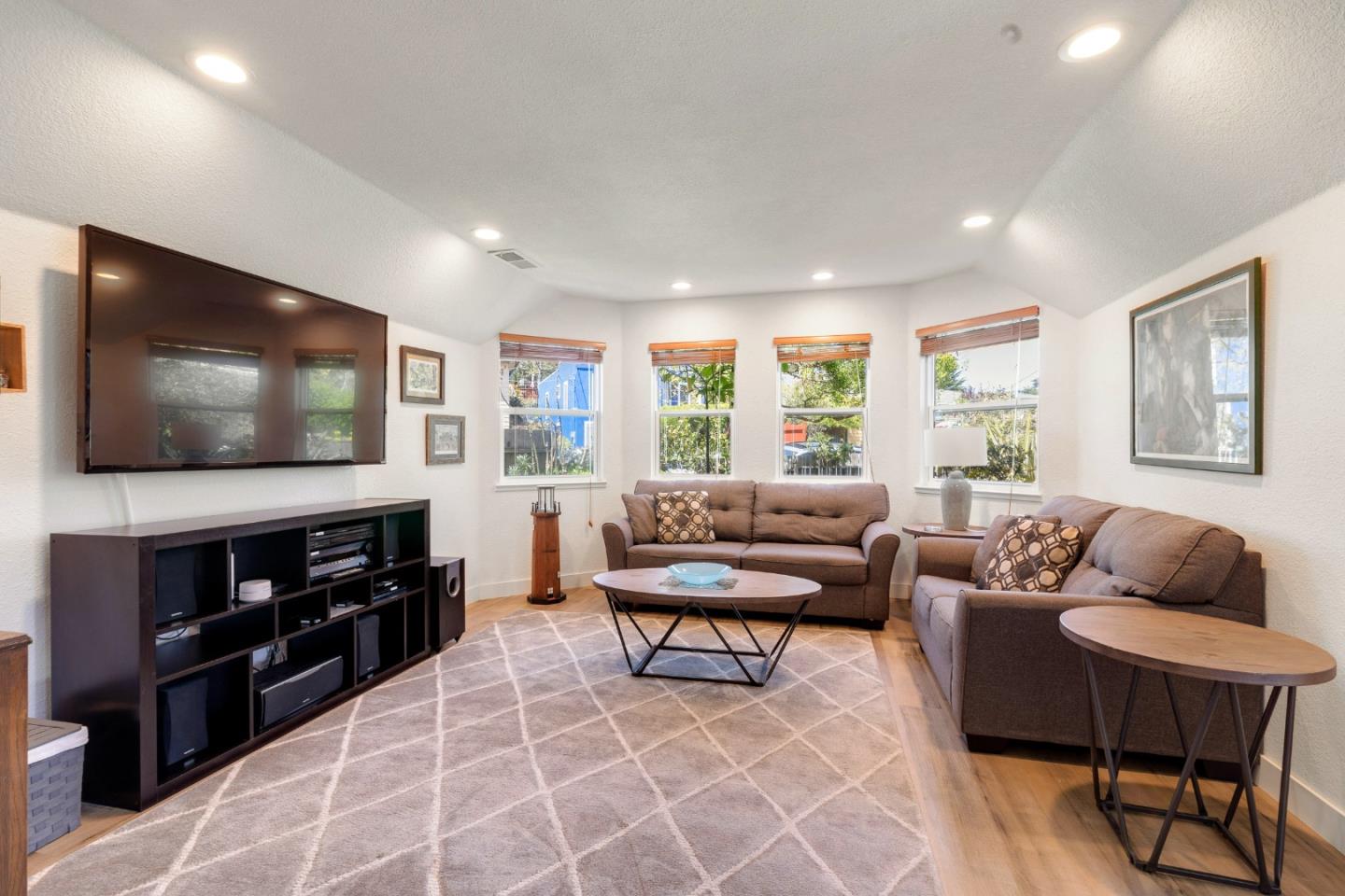 174 Pacific Avenue Pacifica, CA 94044 - Photo 8 of 31 a living room with furniture and a flat screen tv