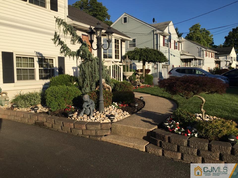 17 Wilshire Road Edison, NJ 08817 - Photo 12 of 19 front view of a house with a yard