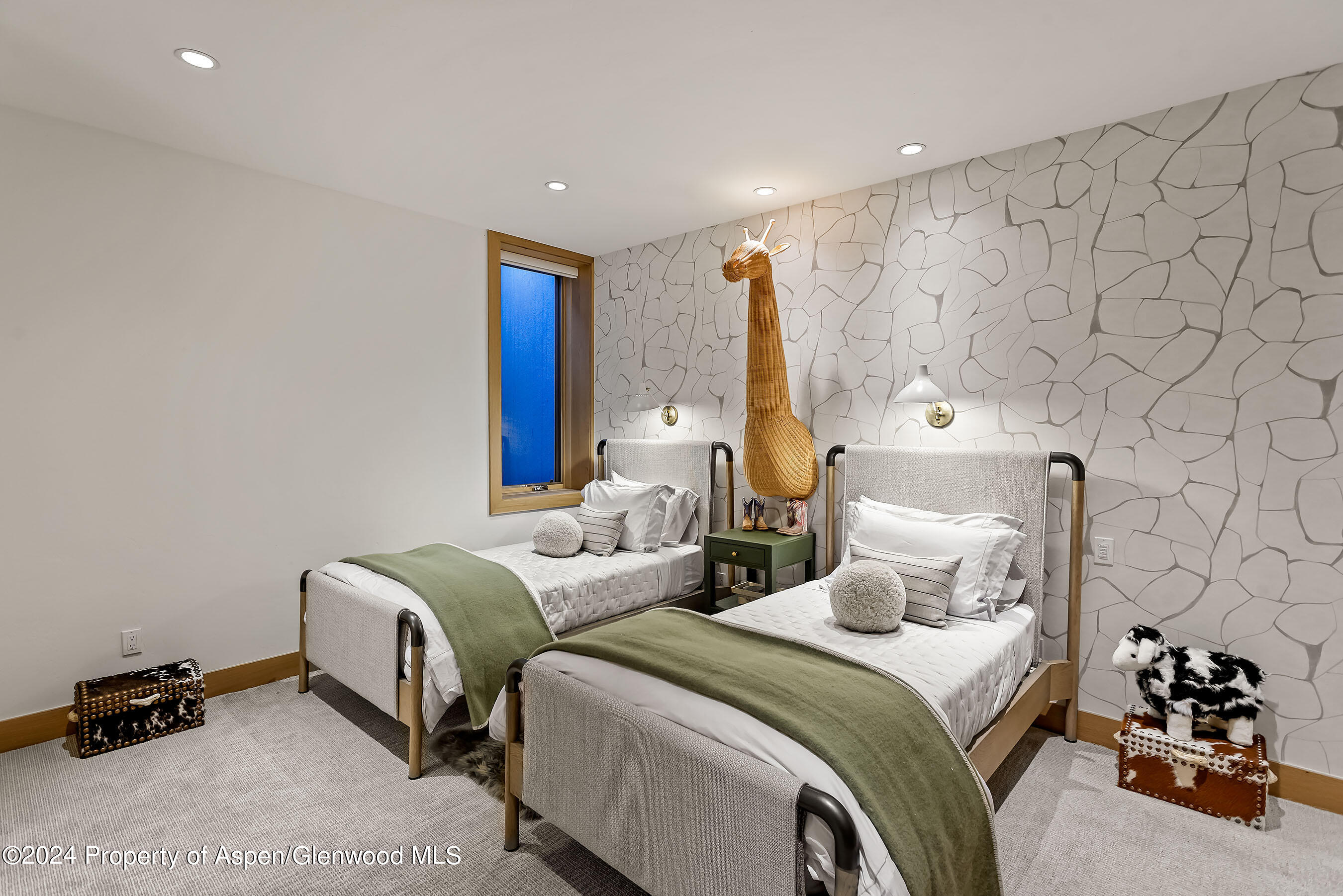 1190 Riverside Drive Aspen, CO 81611 - Photo 17 of 31 a bedroom with two beds and a lamp