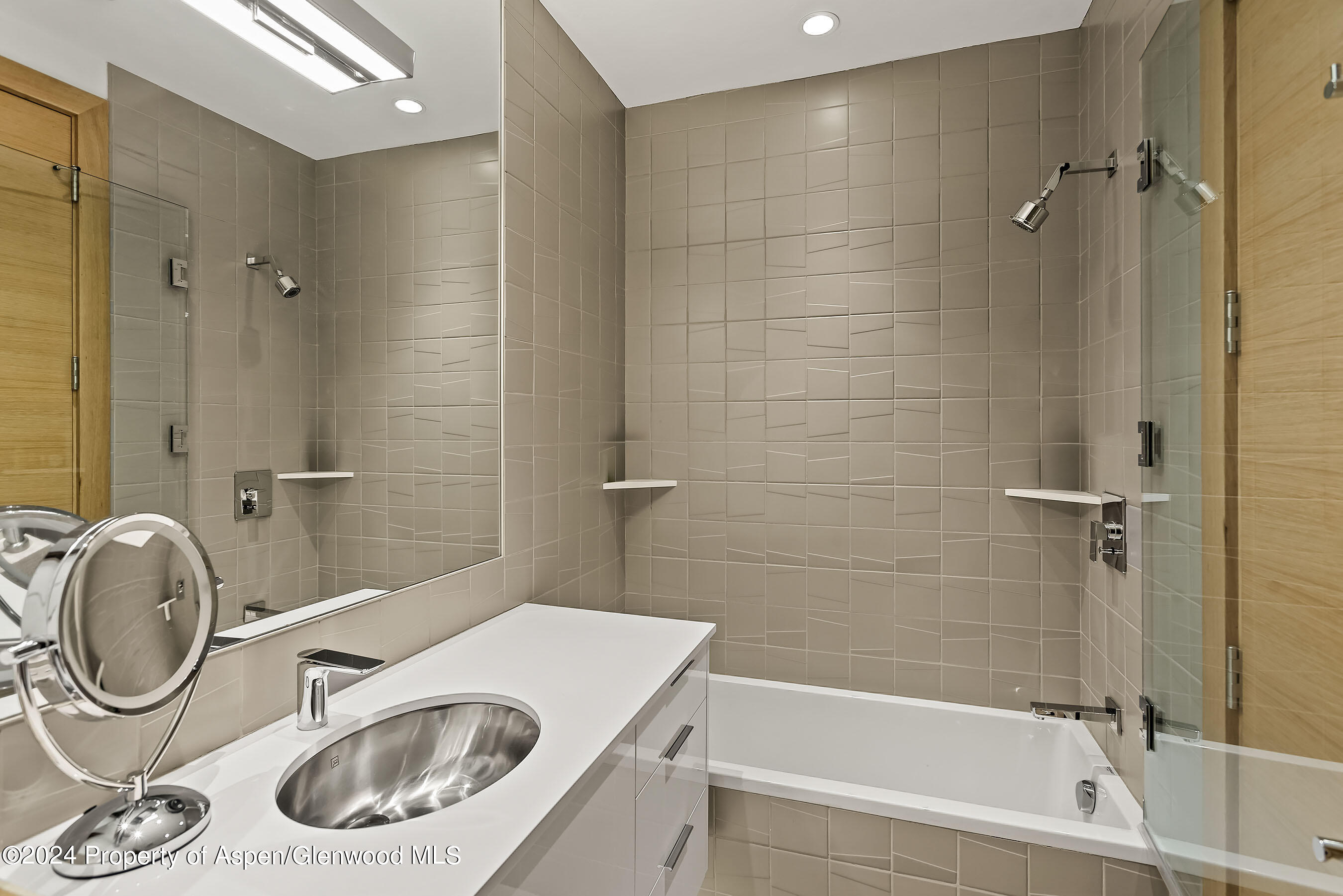 1190 Riverside Drive Aspen, CO 81611 - Photo 18 of 31 a bathroom with a sink a toilet and shower