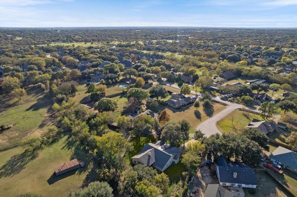 3801 Berry Hill Court Double Oak, TX 75028 - Photo 32 of 33 an aerial view of residential building with green space
