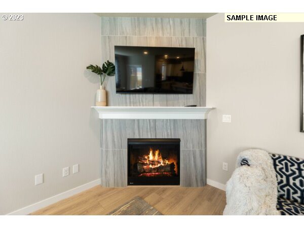224 North 89th Loop, Unit 85 Ridgefield, WA 98642 - Photo 15 of 32 a living room with a fireplace
