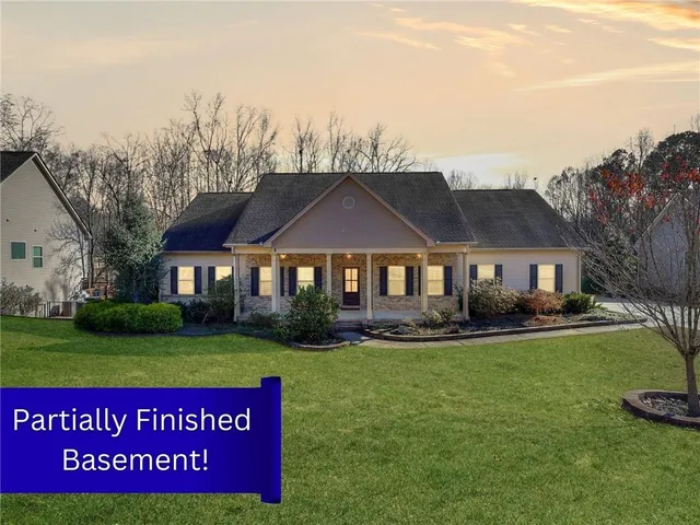 a view of a house with a big yard