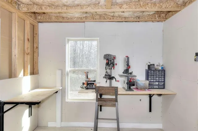 a room with furniture and window