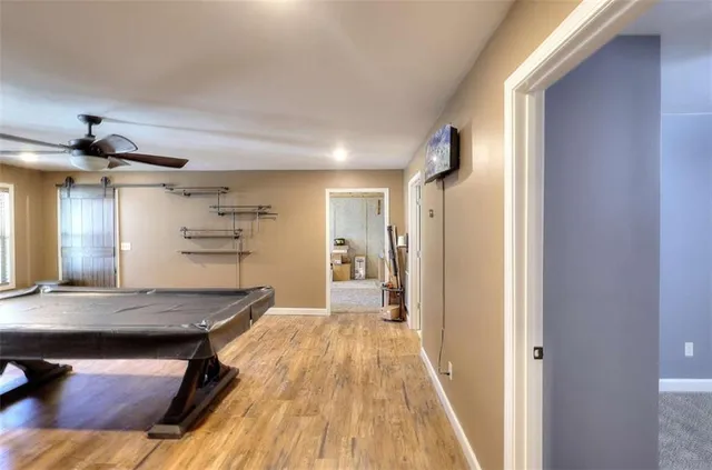 a view of a living room and hardwood floor