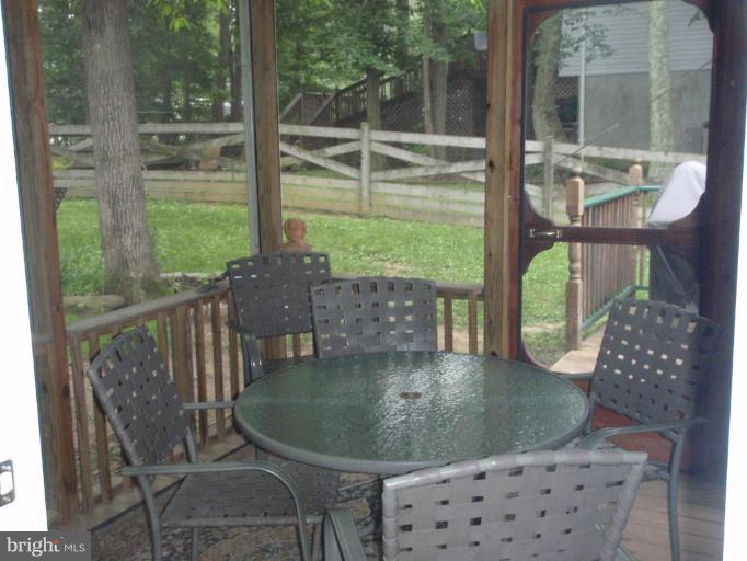 11456 Rawhide Road Lusby, MD 20657 - Photo 10 of 10 a view of outdoor space yard and balcony