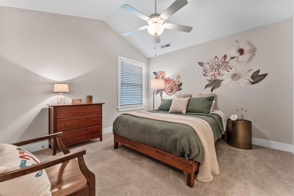134 Pearce Road Mars, PA 16046 - Photo 18 of 25 a bedroom with a bed and a chandelier