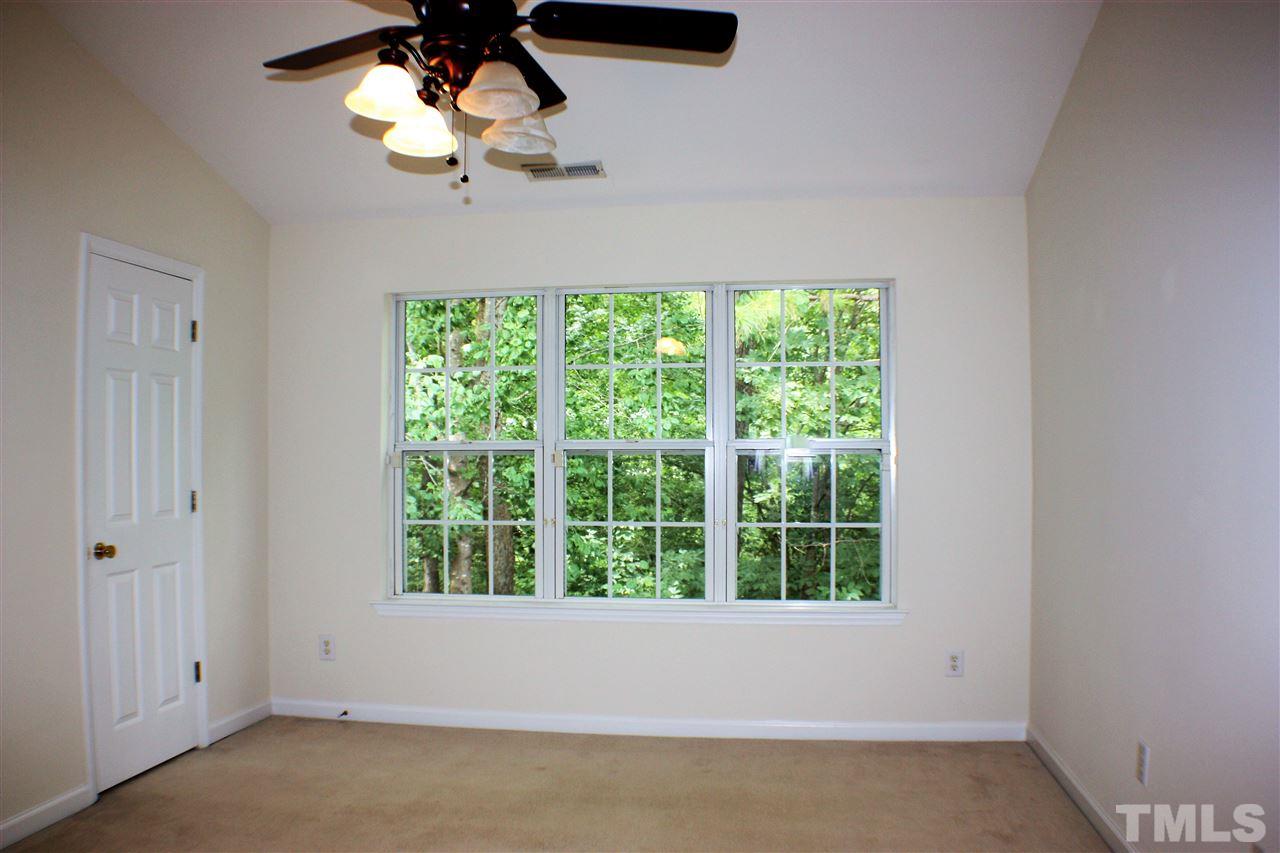 4750 Black Mountain Path Raleigh, NC 27612 - Photo 16 of 30 a view of room with a ceiling fan and window