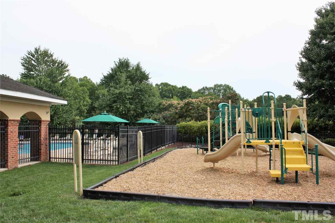 4750 Black Mountain Path Raleigh, NC 27612 - Photo 28 of 30 a view of a house with a yard patio and slide
