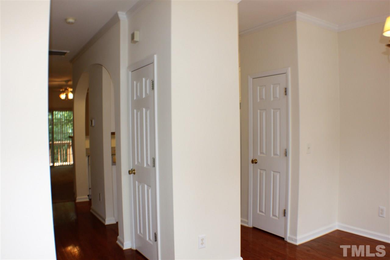 4750 Black Mountain Path Raleigh, NC 27612 - Photo 4 of 30 a view of a hallway with wooden floor