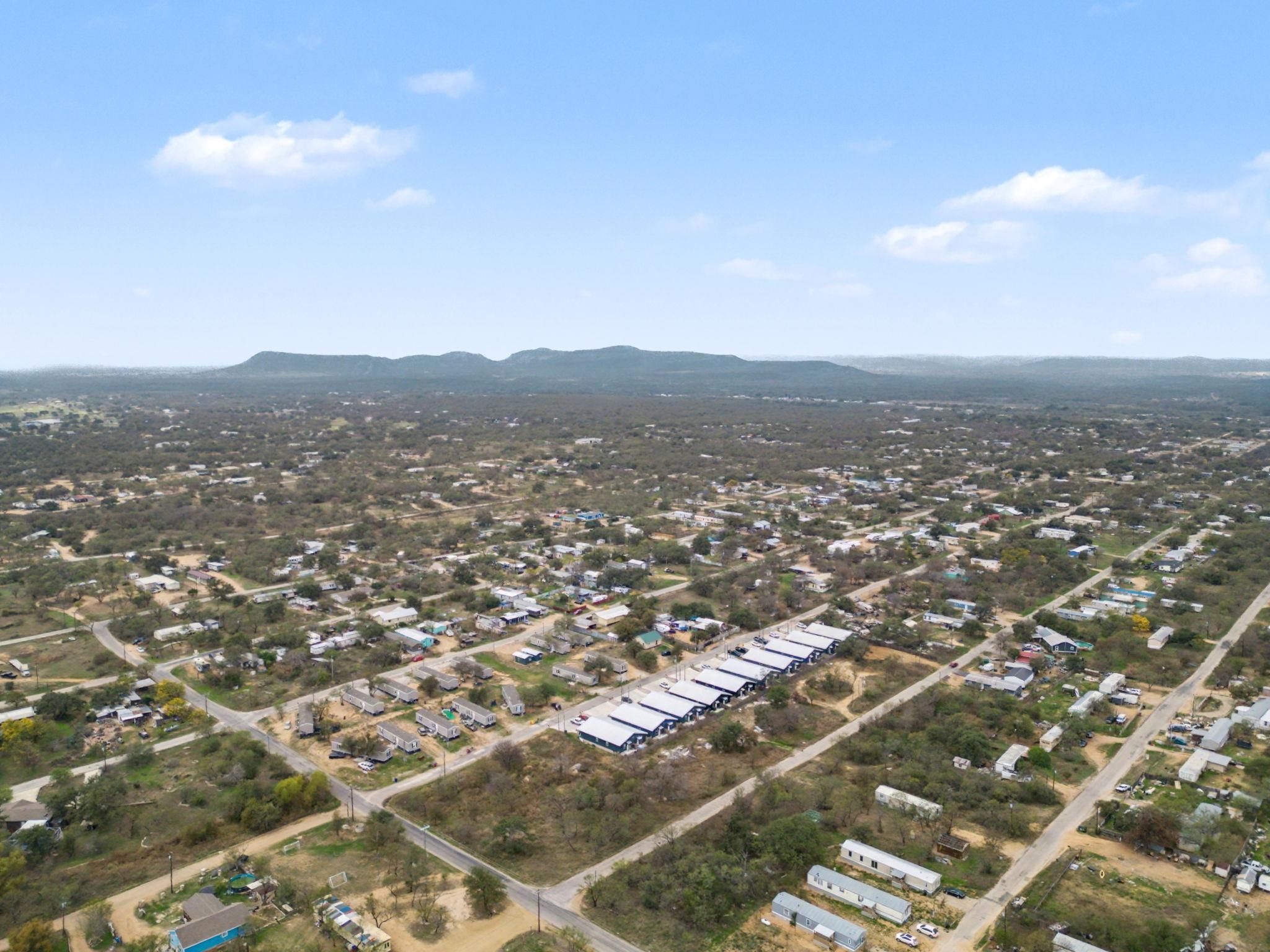 Lot 353 Anson Kingsland, TX 78639 - Photo 13 of 13 an aerial view of residential houses with city view