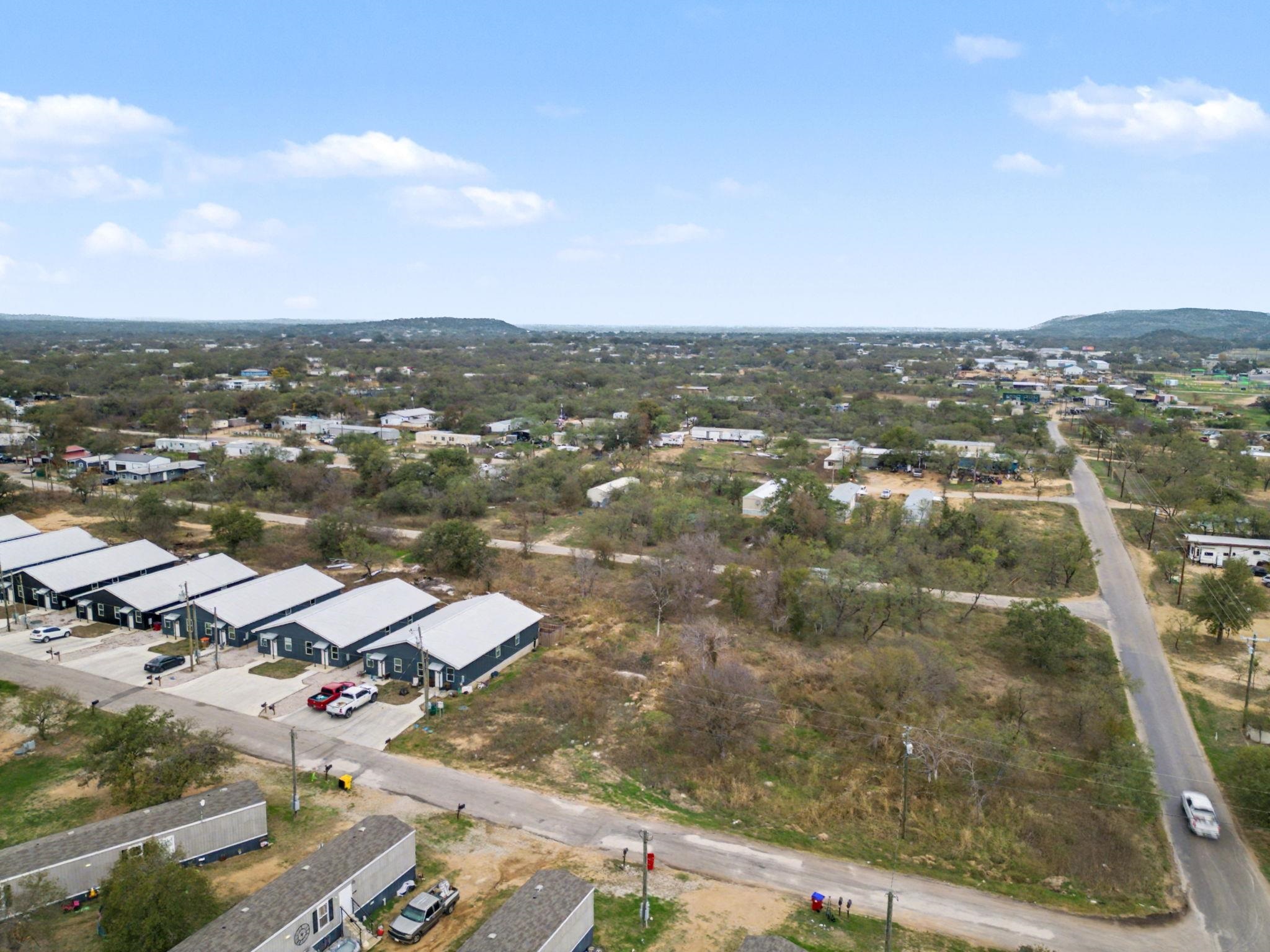 Lot 353 Anson Kingsland, TX 78639 - Photo 10 of 13 an aerial view of residential houses with city view
