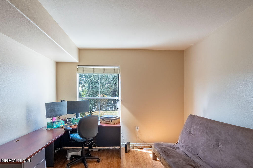 9050 Double R Boulevard, Unit 212 Reno, NV 89521 - Photo 16 of 33 a workspace with furniture and a window