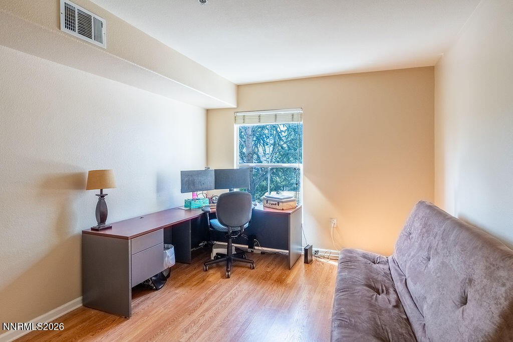 9050 Double R Boulevard, Unit 212 Reno, NV 89521 - Photo 18 of 33 a workspace with furniture and a window