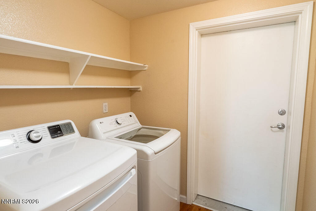 9050 Double R Boulevard, Unit 212 Reno, NV 89521 - Photo 21 of 33 a utility room with dryer and washer