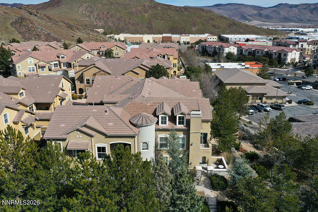 9050 Double R Boulevard, Unit 212 Reno, NV 89521 - Photo 29 of 33 an aerial view of residential houses with outdoor space
