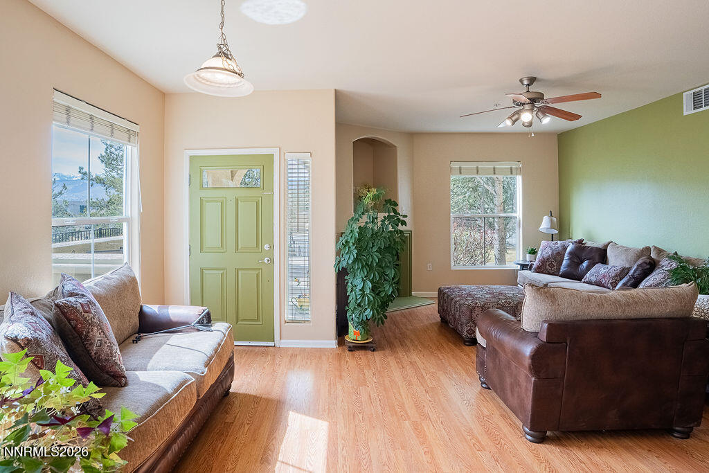 9050 Double R Boulevard, Unit 212 Reno, NV 89521 - Photo 3 of 33 a living room with furniture and a large window