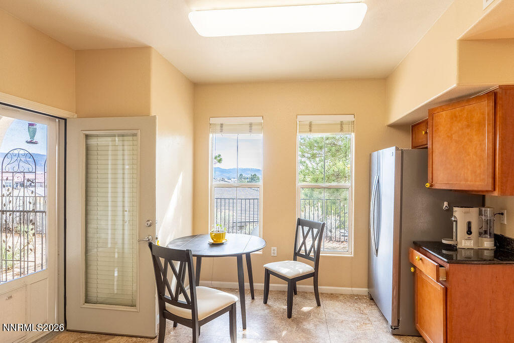 9050 Double R Boulevard, Unit 212 Reno, NV 89521 - Photo 7 of 33 a view of a livingroom with furniture and a window