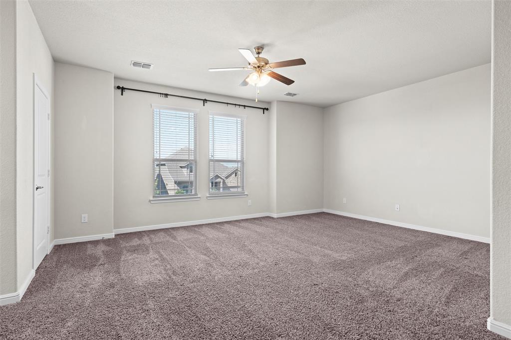 912 Falcon Road Argyle, TX 76226 - Photo 26 of 40 Huge game room with ceiling fan