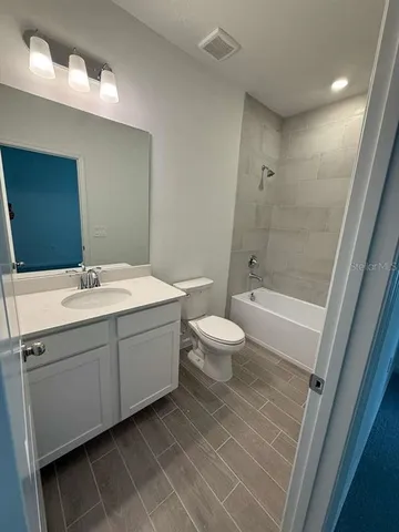 a view of hallway with mirror