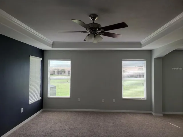 an empty room with windows