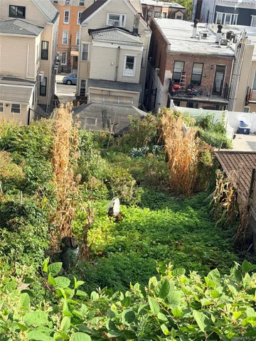 a view of building with green space