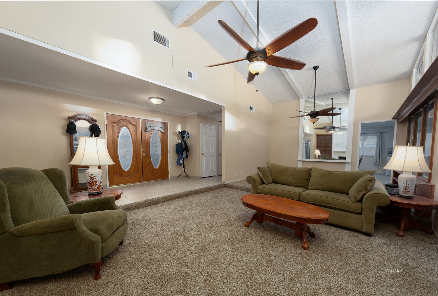 649 Peg Street Ridgecrest, CA 93555 - Photo 15 of 38 a living room with furniture and a ceiling fan