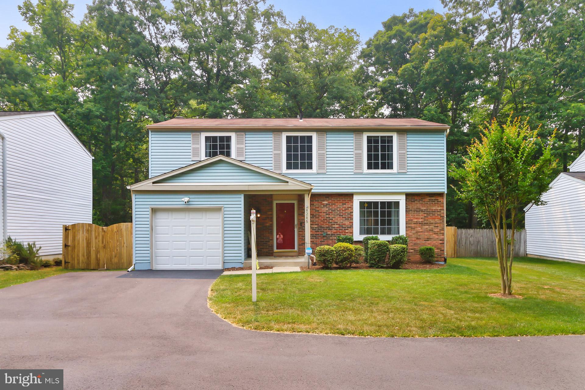 Nicely landscaped and double parking pad + garage